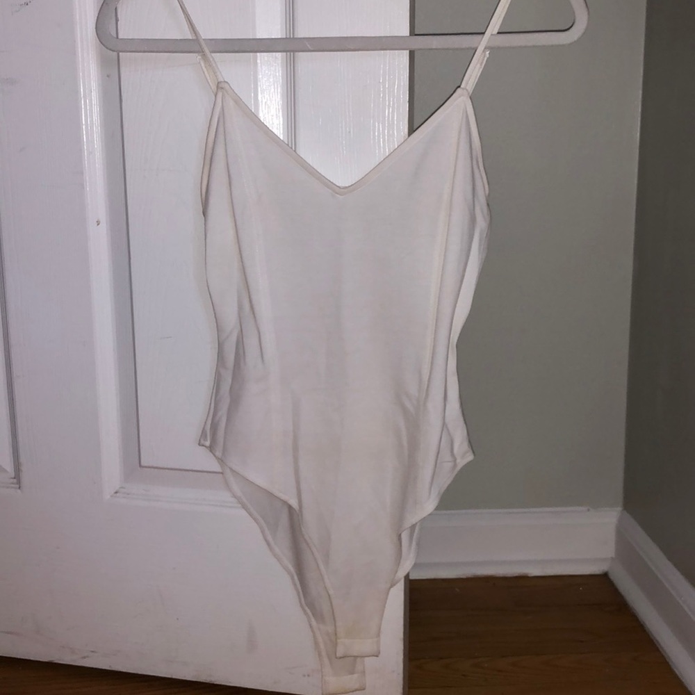 Forever 21 white body suit with crossing